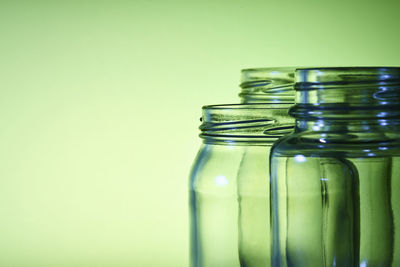 Close-up of glass bottle against white background