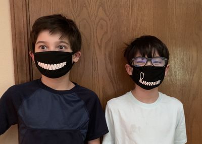 Portrait of boy wearing mask