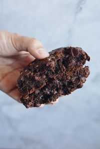 Close-up of hand holding ice cream