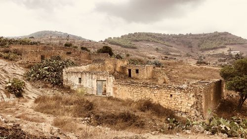 Scenic view of old ruins against sky