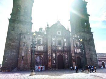 Tourists in front of historic building