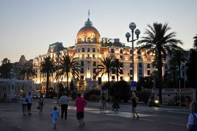 Tourists in front of building