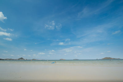 View of beach against blue sky