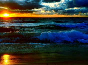 Scenic view of sea against sky during sunset