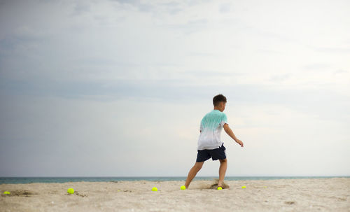 Trainings on the sandy beach. physical training of athletes.