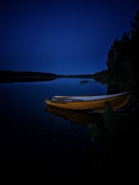 A boat at a swedish lake at summer midnight