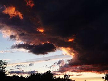 Low angle view of dramatic sky during sunset