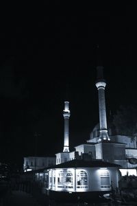 Low angle view of illuminated building at night