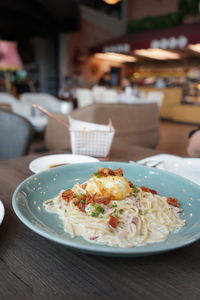 Close-up of food served on table