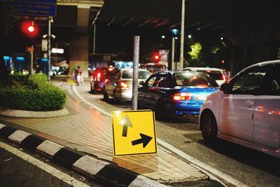 Cars on road at night