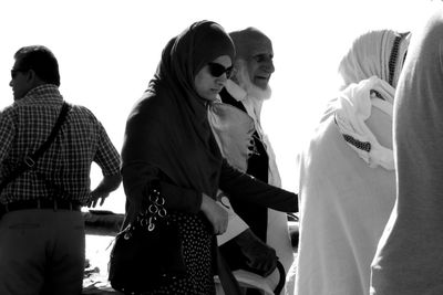 Group of people against the sky
