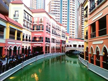 View of canal along buildings