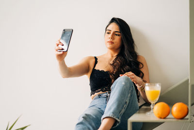 Young woman using mobile phone