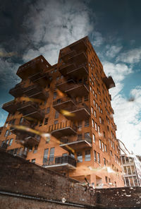 Low angle view of residential building against sky