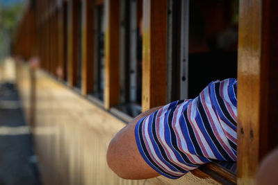 Low section of man with railing