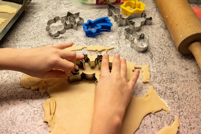 High angle view of people playing with toy