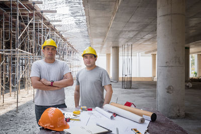 Rear view of man working at construction site