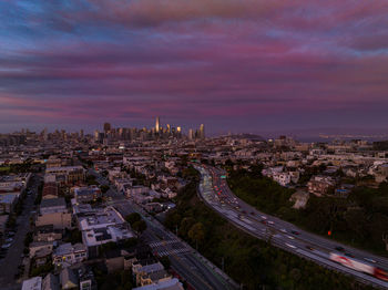 High angle view of cityscape against sky during sunset