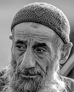 Close-up portrait of man wearing mask