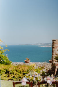 Scenic view of sea against clear sky