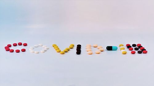 Multi colored pencils against white background