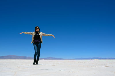 Full length of a woman in desert