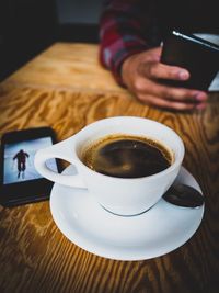 Coffee cup on table