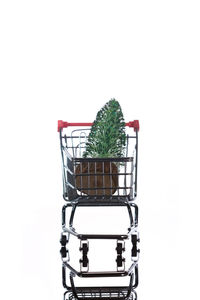 Close-up of wicker basket against white background