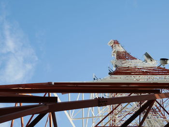 Low angle view of microwave tower against sky