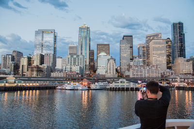 Woman with city in the background