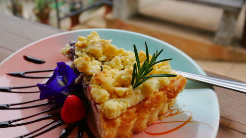 Close-up of fruit salad in plate on table