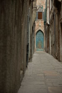 Narrow alley in old building