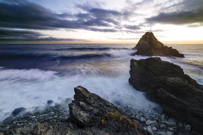 Scenic view of sea against sky during sunset