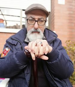 Portrait of mature man gesturing 