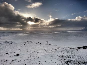 Scenic view of sea against sky at sunset