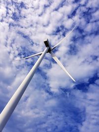 Low angle view of wind turbine against sky