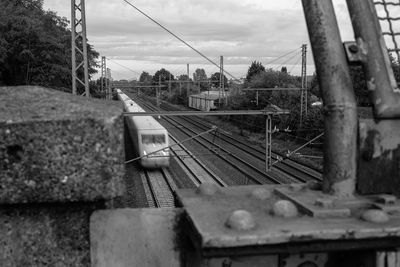 Train on railroad track against sky