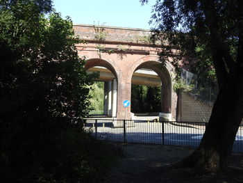 Old building in park against sky