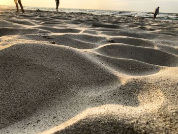 High angle view of footprints on beach