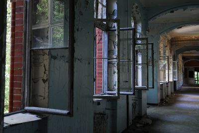 Open windows of abandoned building