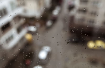 Full frame shot of wet glass window