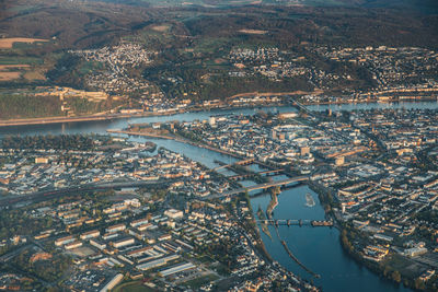 High angle view of river amidst buildings in city