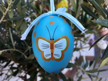 Close-up of decoration hanging on tree