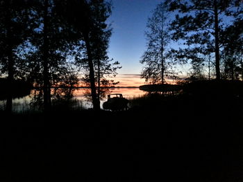 Scenic view of landscape against sky at sunset