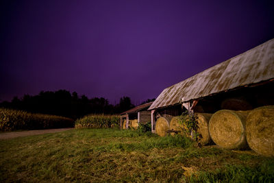 Agricultural field against sky at night