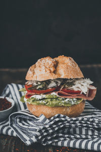 Close-up of burger on table