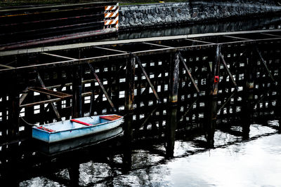 High angle view of nautical vessel in canal during winter