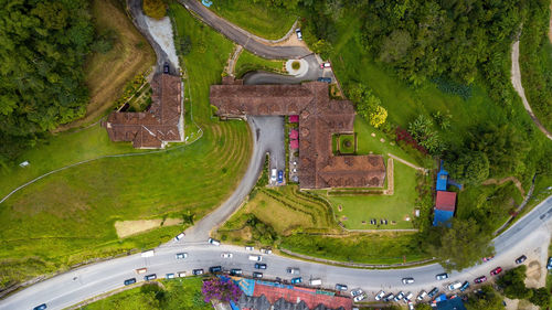 Top view of old houses next to the road in cameron highlands.