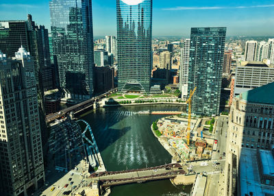 High angle view of river amidst buildings in city
