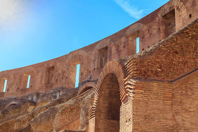 Low angle view of old ruins against sky